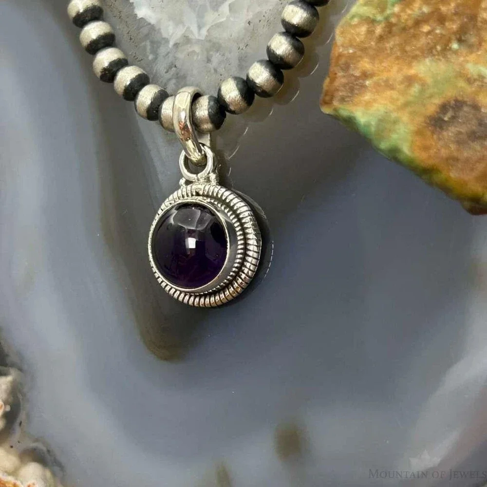 Sterling Southwestern Style Round Amethyst Decorated Charm/Pendant For Women